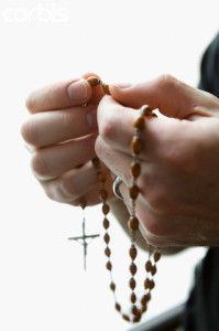 Hand Holding Rosary